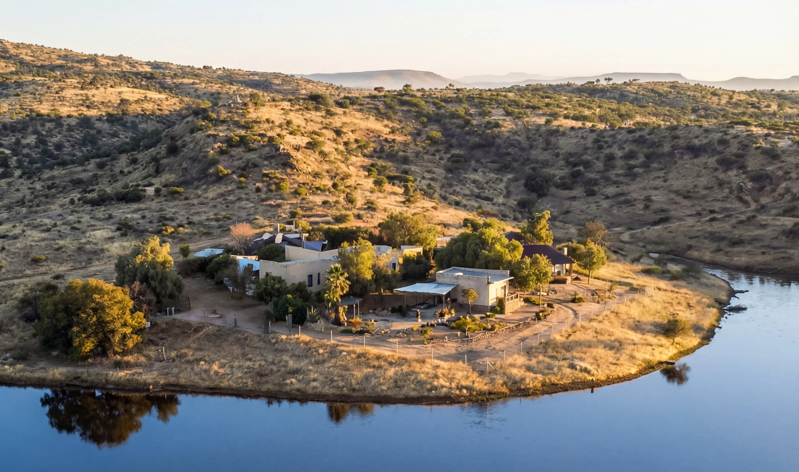The Simmenau farmhouse beside the lake in the Khomas Hochland