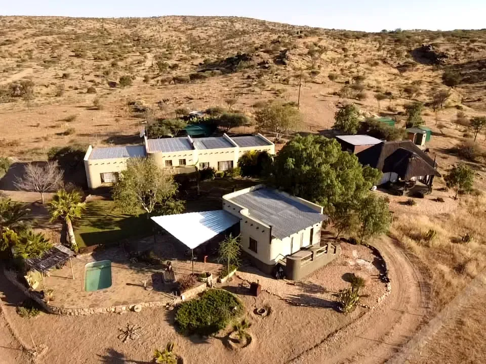 Aerial view of the Simmenau farm buildings and pool