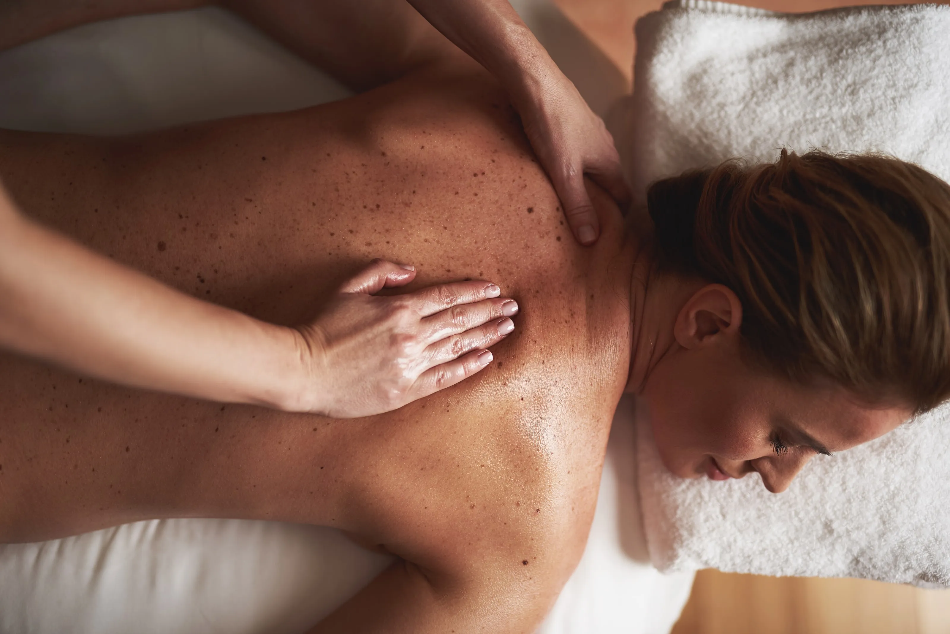 A guest enjoying a back massage